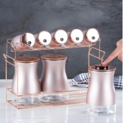 طقم توابل على قاعده معدنيه لون وردي عدد 8 طقم توابل على قاعده معدنيه لون وردي عدد 8