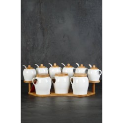 طقم توابل على قاعده خشبيه  مصنوعه من بورسلان لون ابيض 9قطع