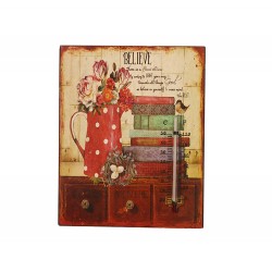 لوحة ديكورية مع ميزان حرارة